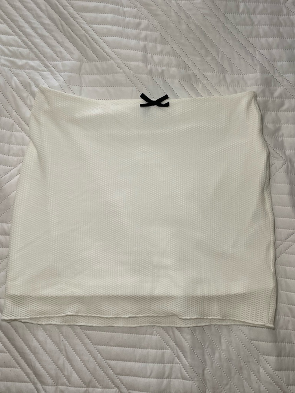 Cream Textured Mini Skirt with Bow Accent